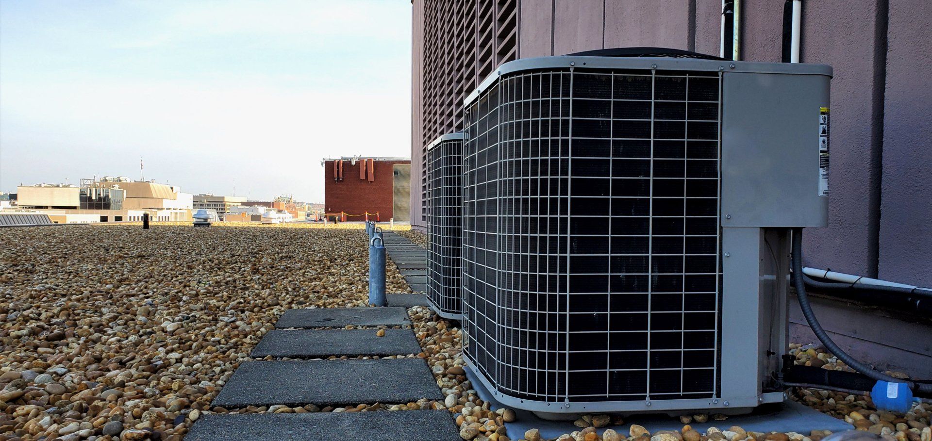 Cool Camel technicians servicing rooftop HVAC units in Las Vegas